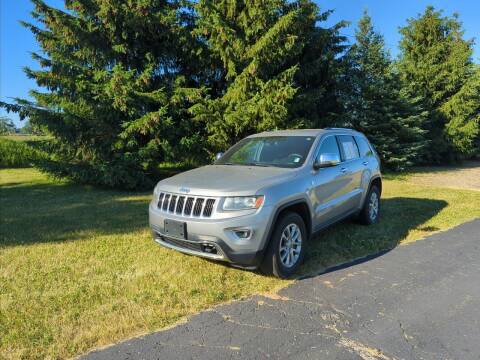 2014 Jeep Grand Cherokee for sale at Carmart Auto Sales Inc in Schoolcraft MI