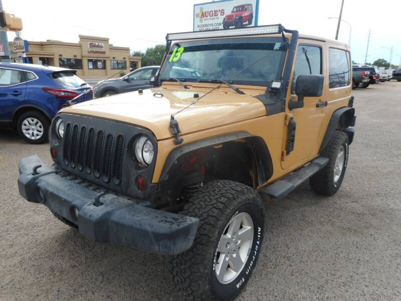 2013 Jeep Wrangler for sale at AUGE'S SALES AND SERVICE in Belen NM