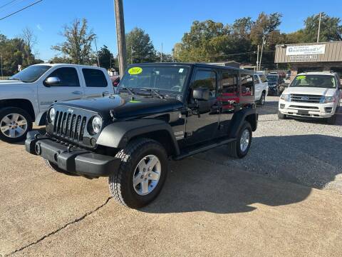 2014 Jeep Wrangler Unlimited for sale at H & H USED CARS, INC in Tunica MS