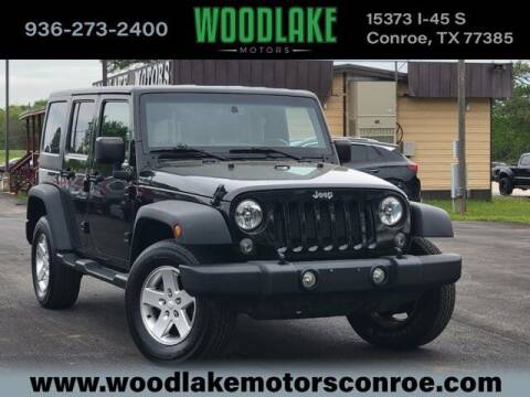 2015 Jeep Wrangler Unlimited for sale at WOODLAKE MOTORS in Conroe TX
