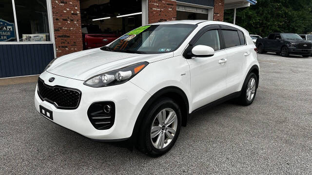 2017 Kia Sportage for sale at North Ridge Auto Center LLC in Madison, OH