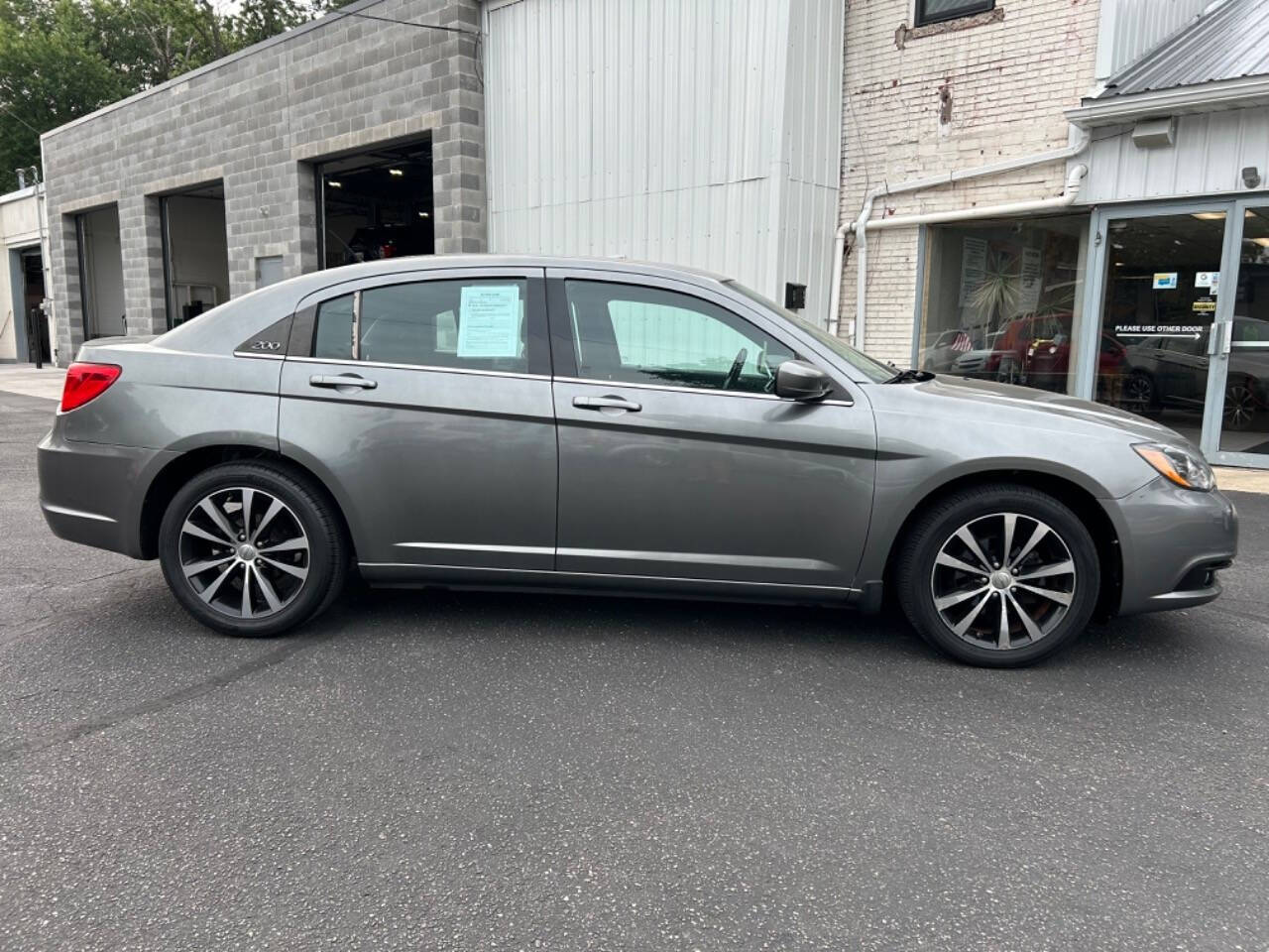 2013 Chrysler 200 for sale at Auto Shop in Wyoming, MI