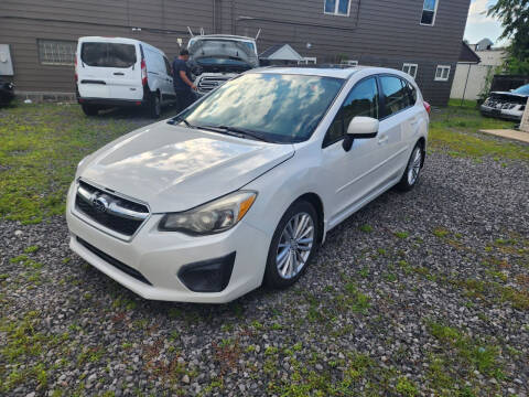 2012 Subaru Impreza for sale at Mario's Auto Repair and Sales LLC in Duryea PA