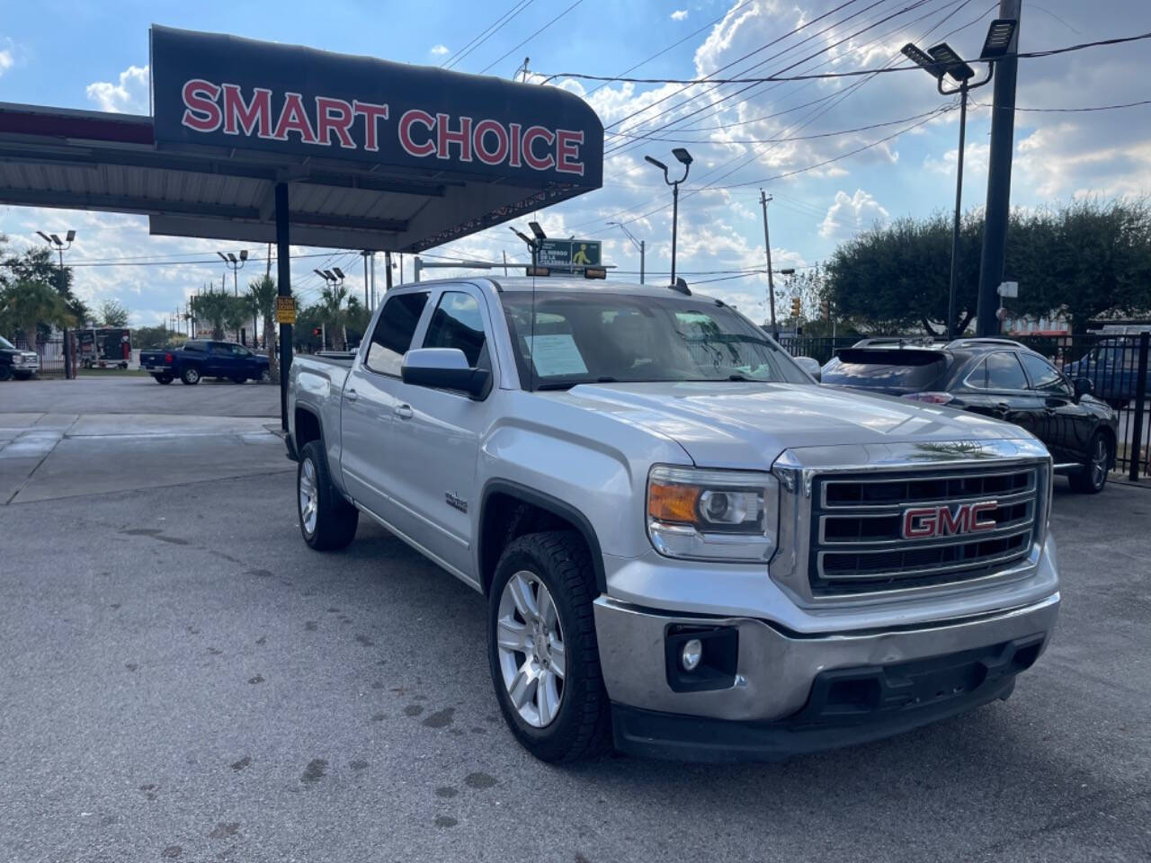 2015 GMC Sierra 1500 for sale at SMART CHOICE AUTO in Pasadena, TX