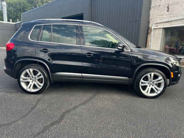 2013 Volkswagen Tiguan for sale at Auto Shop in Wyoming, MI