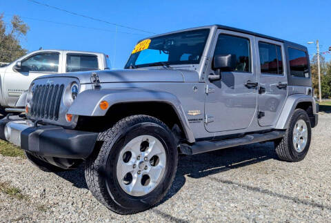 2013 Jeep Wrangler Unlimited for sale at MAIN STREET AUTO SALES INC in Austin IN