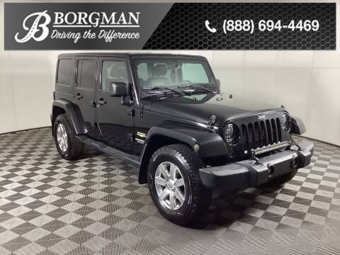 2015 Jeep Wrangler Unlimited for sale at Everyone's Financed At Borgman - BORGMAN OF HOLLAND LLC in Holland MI