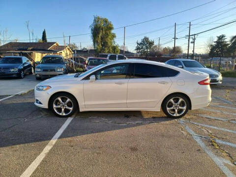 2014 Ford Fusion for sale at RN AUTO GROUP in San Bernardino CA