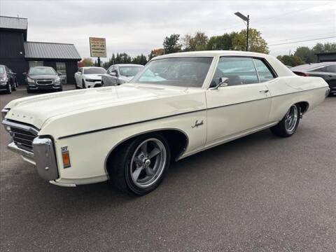 1969 Chevrolet Impala for sale at HUFF AUTO GROUP in Jackson MI