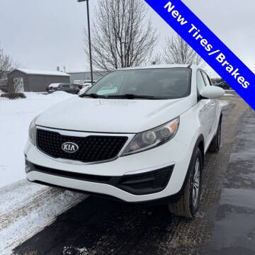 2015 Kia Sportage for sale at MIDLAND CREDIT REPAIR in Midland MI