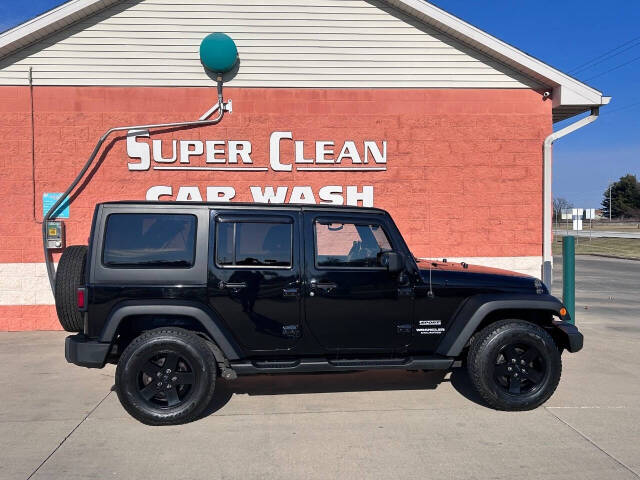 2014 Jeep Wrangler Unlimited for sale at Illinois Auto Wholesalers in Tolono, IL