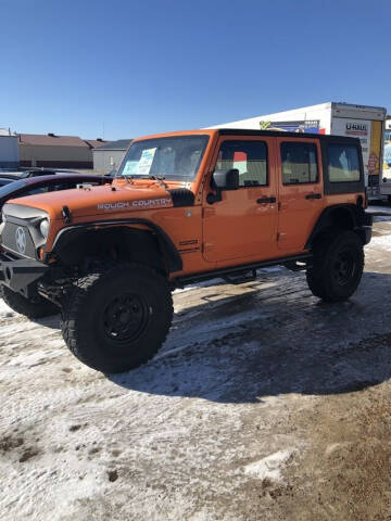 2012 Jeep Wrangler Unlimited for sale at Lake Herman Auto Sales in Madison SD