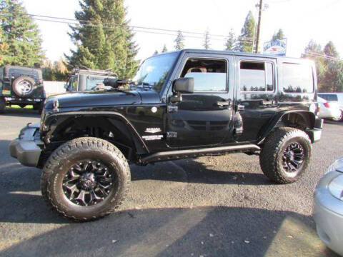 2012 Jeep Wrangler Unlimited for sale at Hall Motors LLC in Vancouver WA