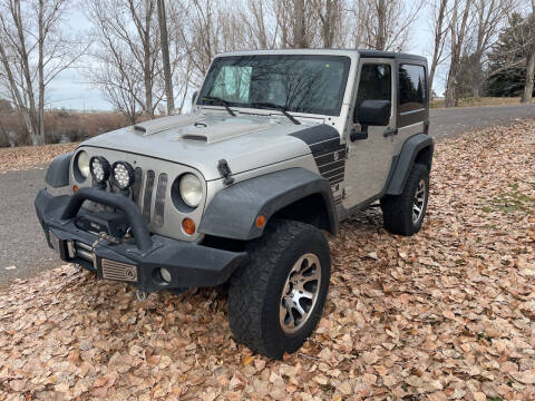 2007 Jeep Wrangler for sale at BELOW BOOK AUTO SALES in Idaho Falls ID