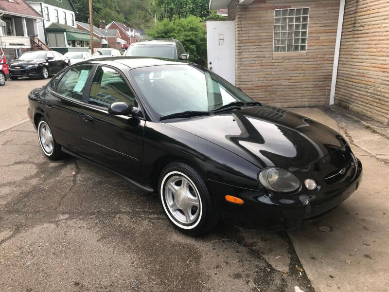 1999 Ford Taurus for sale at Penn Detroit Automotive in New Kensington PA