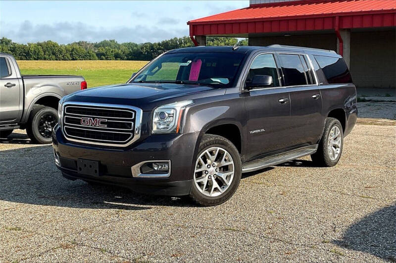 Used 2015 GMC Yukon XL SLT with VIN 1GKS2HKC8FR218883 for sale in Montevideo, Minnesota