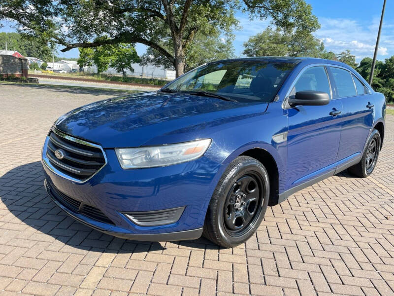 2014 Ford Taurus for sale at PFA Autos in Union City GA