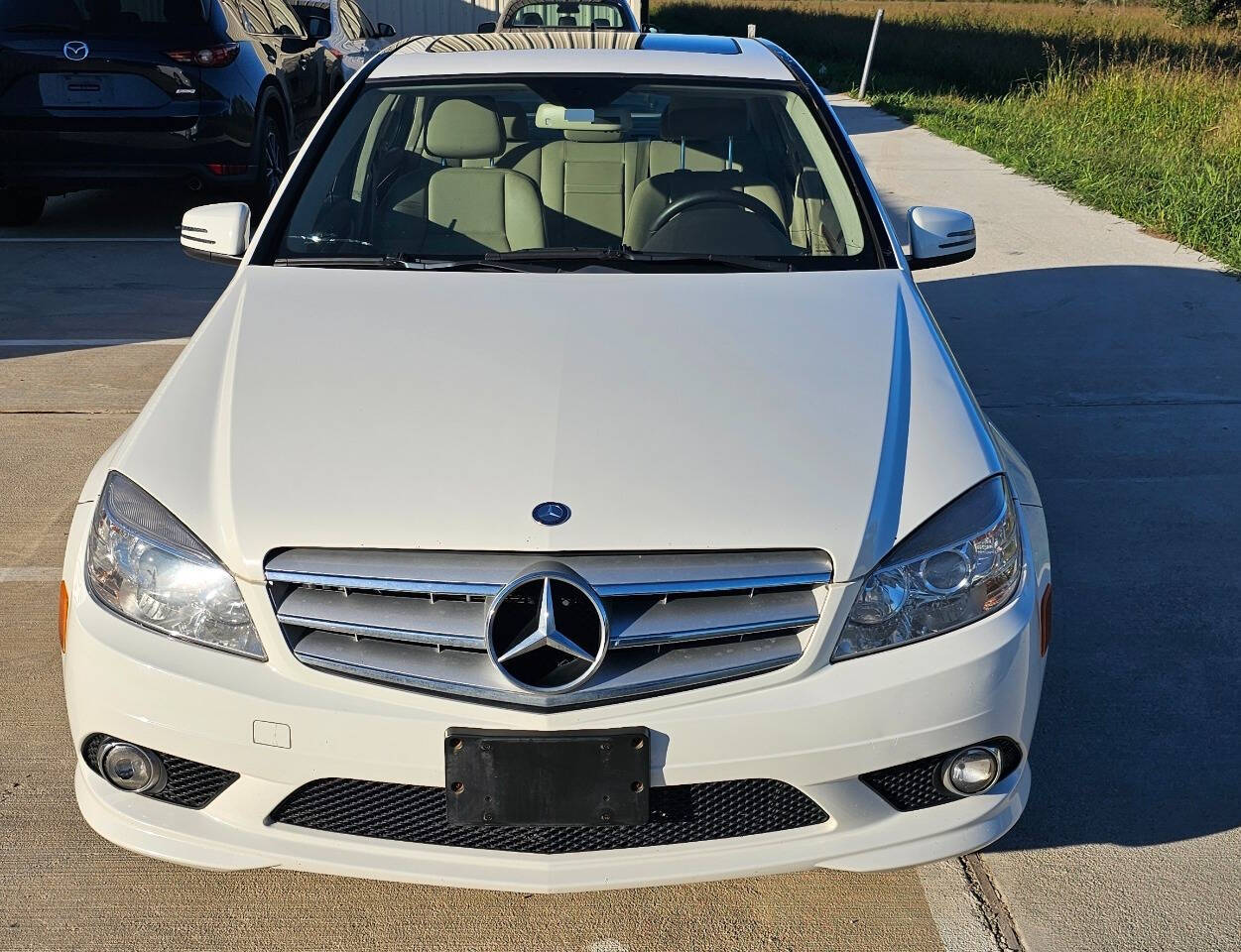 2010 Mercedes-Benz C-Class for sale at CAR MARKET AUTO GROUP in Sugar Land, TX