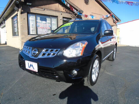 2013 Nissan Rogue for sale at IBARRA MOTORS INC in Berwyn IL