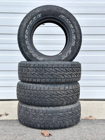  Bridgestone Dueler A/T P265/70R17 113T for sale at Atlas Automotive Sales in Hayden ID