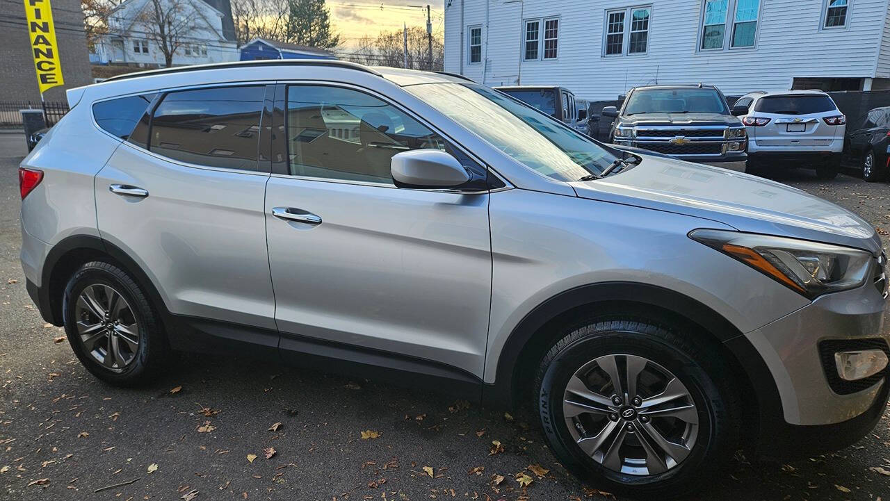 2015 Hyundai SANTA FE Sport for sale at RENOS AUTO SALES LLC in Waterbury, CT