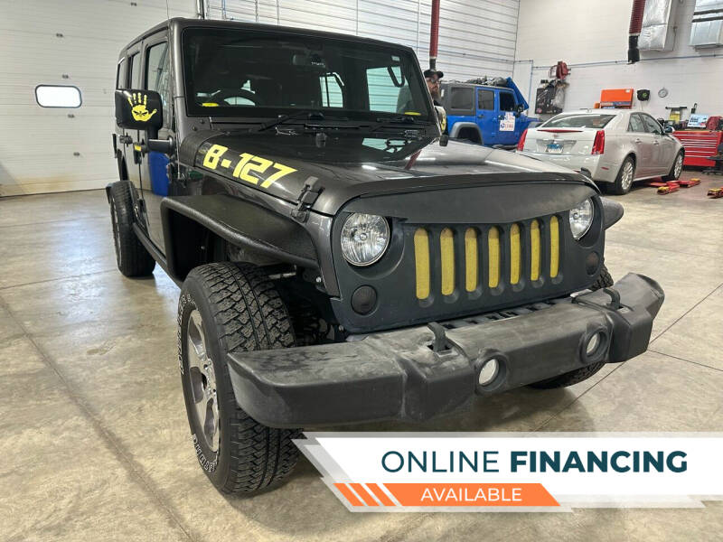 2017 Jeep Wrangler Unlimited for sale at Postal Pete in Galena IL