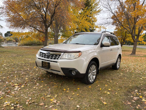2011 Subaru Forester for sale at BELOW BOOK AUTO SALES in Idaho Falls ID