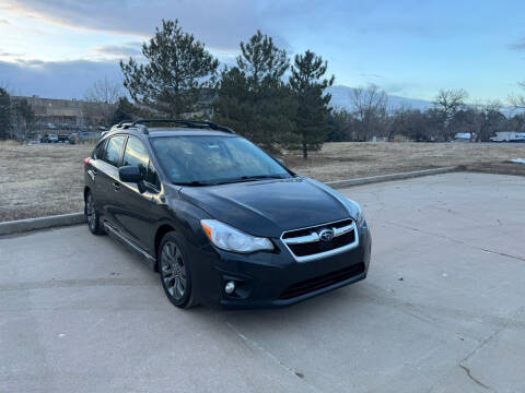 2013 Subaru Impreza for sale at QUEST MOTORS in Englewood CO