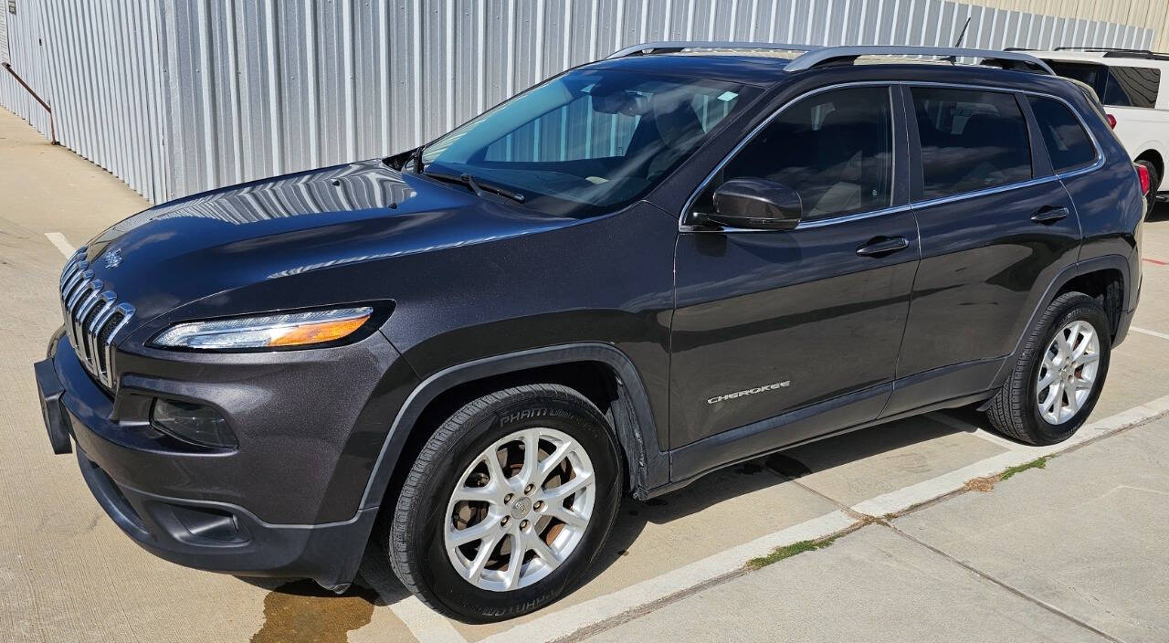 2017 Jeep Cherokee for sale at CAR MARKET AUTO GROUP in Sugar Land, TX