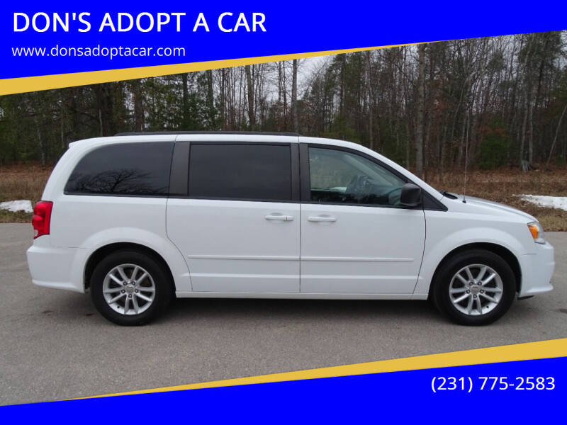2014 Dodge Grand Caravan for sale at DON'S ADOPT A CAR in Cadillac MI