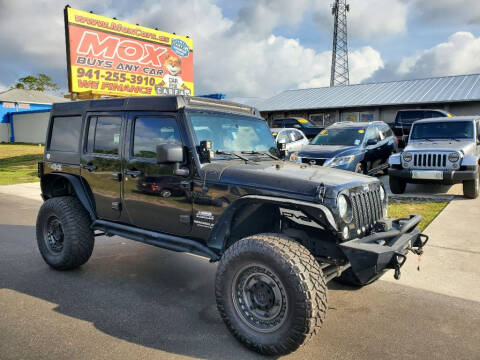 2015 Jeep Wrangler Unlimited for sale at Mox Motors in Port Charlotte FL