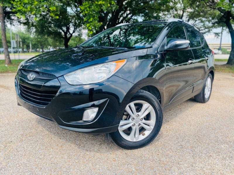 2013 Hyundai Tucson for sale at powerful cars auto group llc in Houston TX