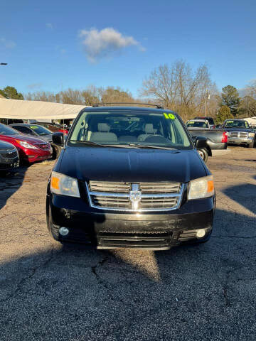 2010 Dodge Grand Caravan for sale at Autocom, LLC in Clayton NC