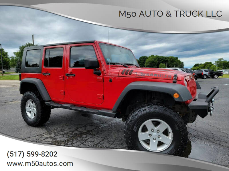 2010 Jeep Wrangler Unlimited for sale at Icon Auto Group in Lake Odessa MI