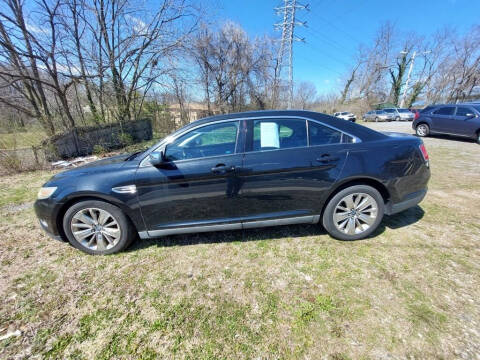 2010 Ford Taurus for sale at FIVE FRIENDS AUTO in Wilmington DE