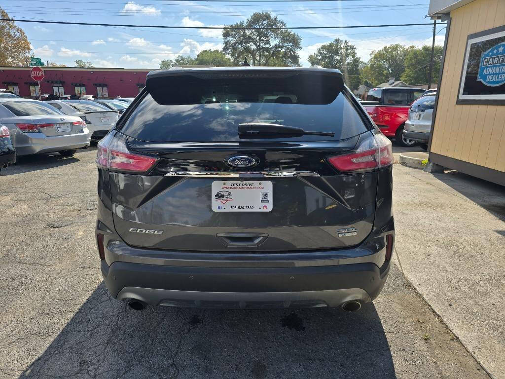 2020 Ford Edge for sale at DAGO'S AUTO SALES LLC in Dalton, GA