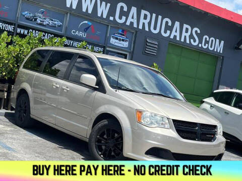2014 Dodge Grand Caravan for sale at CARUCARS LLC in Miami FL