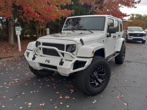 2018 Jeep Wrangler JK Unlimited for sale at THE AUTO FINDERS in Durham NC