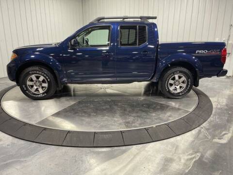 2011 Nissan Frontier for sale at HILAND TOYOTA in Moline IL