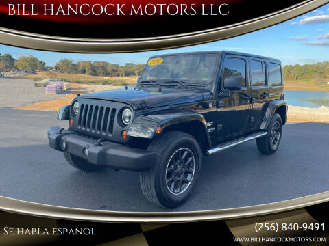 2012 Jeep Wrangler Unlimited for sale at BILL HANCOCK MOTORS LLC in Albertville AL