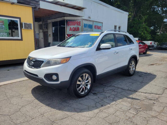 2011 Kia Sorento for sale at DAGO'S AUTO SALES LLC in Dalton, GA