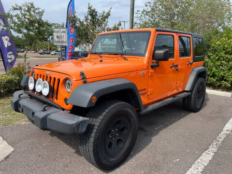 2012 Jeep Wrangler Unlimited for sale at Bay City Autosales in Tampa FL