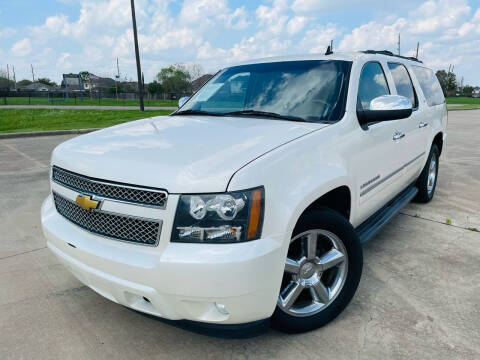2013 Chevrolet Suburban for sale at AUTO DIRECT Bellaire in Houston TX
