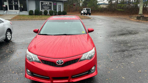 2012 Toyota Camry for sale at AMG Automotive Group in Cumming GA
