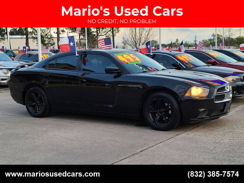 2014 Dodge Charger for sale at Mario's Used Cars in Houston TX
