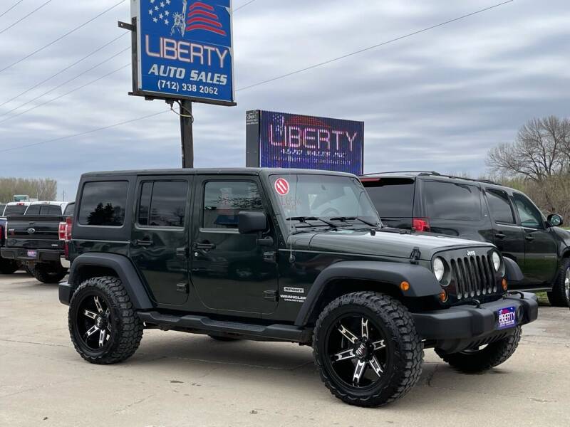 2011 Jeep Wrangler Unlimited for sale at Liberty Auto Sales in Merrill IA