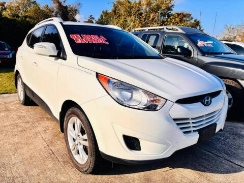 2012 Hyundai Tucson for sale at CE Auto Sales in Baytown TX