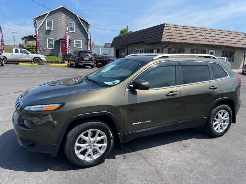 2016 Jeep Cherokee for sale at MAGNUM MOTORS in Reedsville PA
