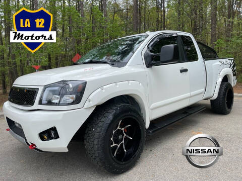 2015 Nissan Titan for sale at LA 12 Motors in Durham NC