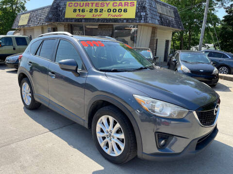 2013 Mazda CX-5 for sale at Courtesy Cars in Independence MO